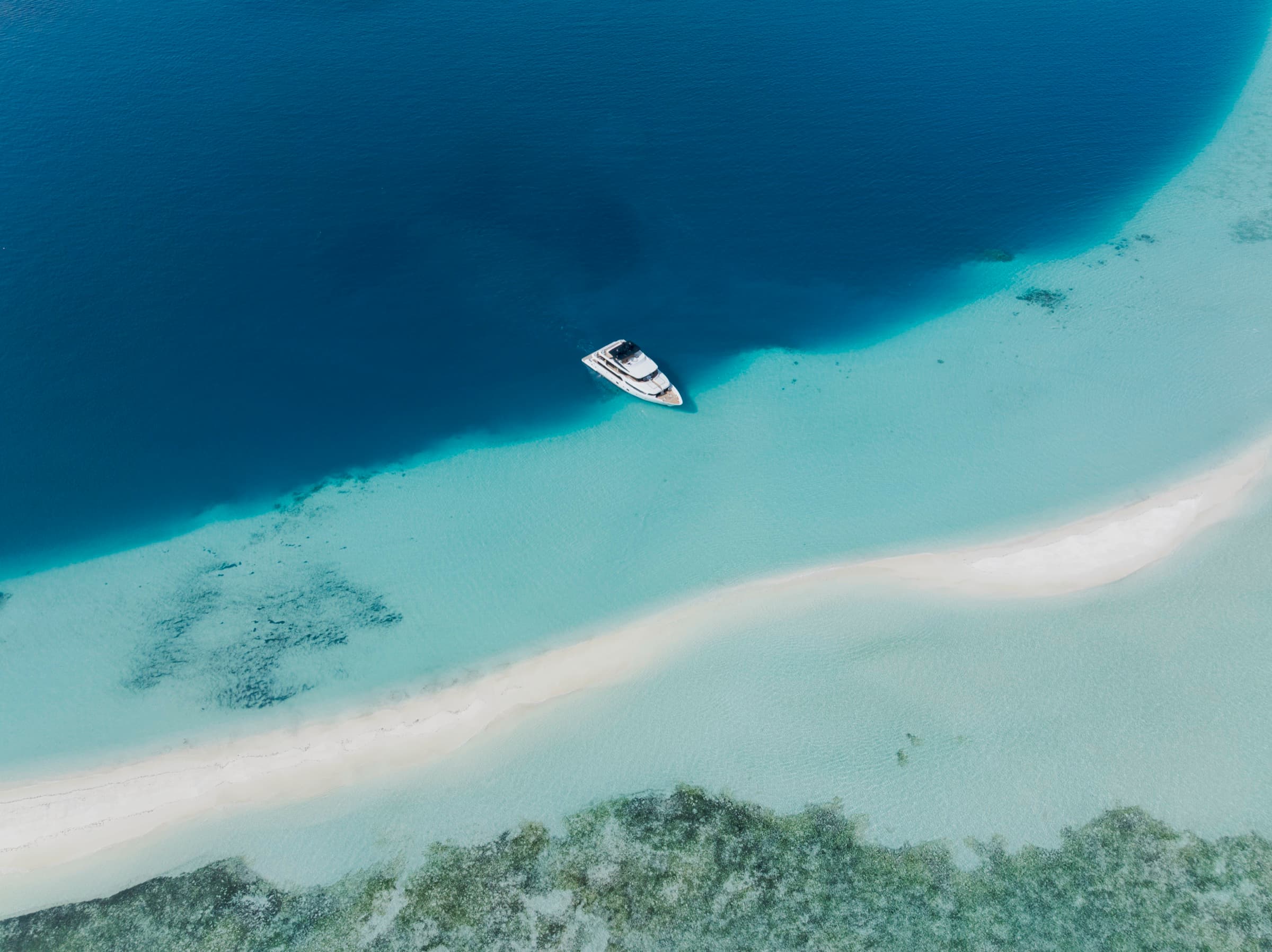 SERAI yacht cruising through turquoise Maldivian waters